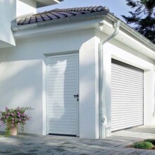 White garage door with side walk in door